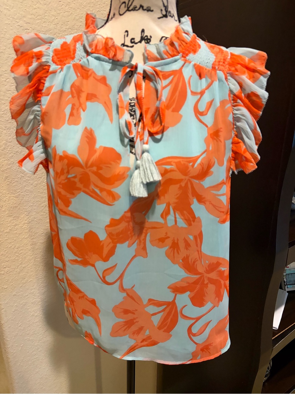 Olivaceous Orange Floral Tie-Front Camisole on Light Blue